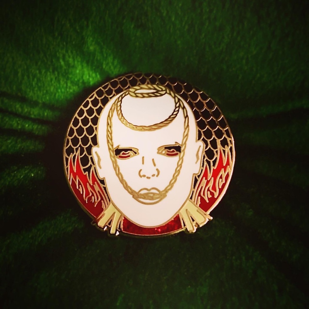 McQueen tribute enamel pin.